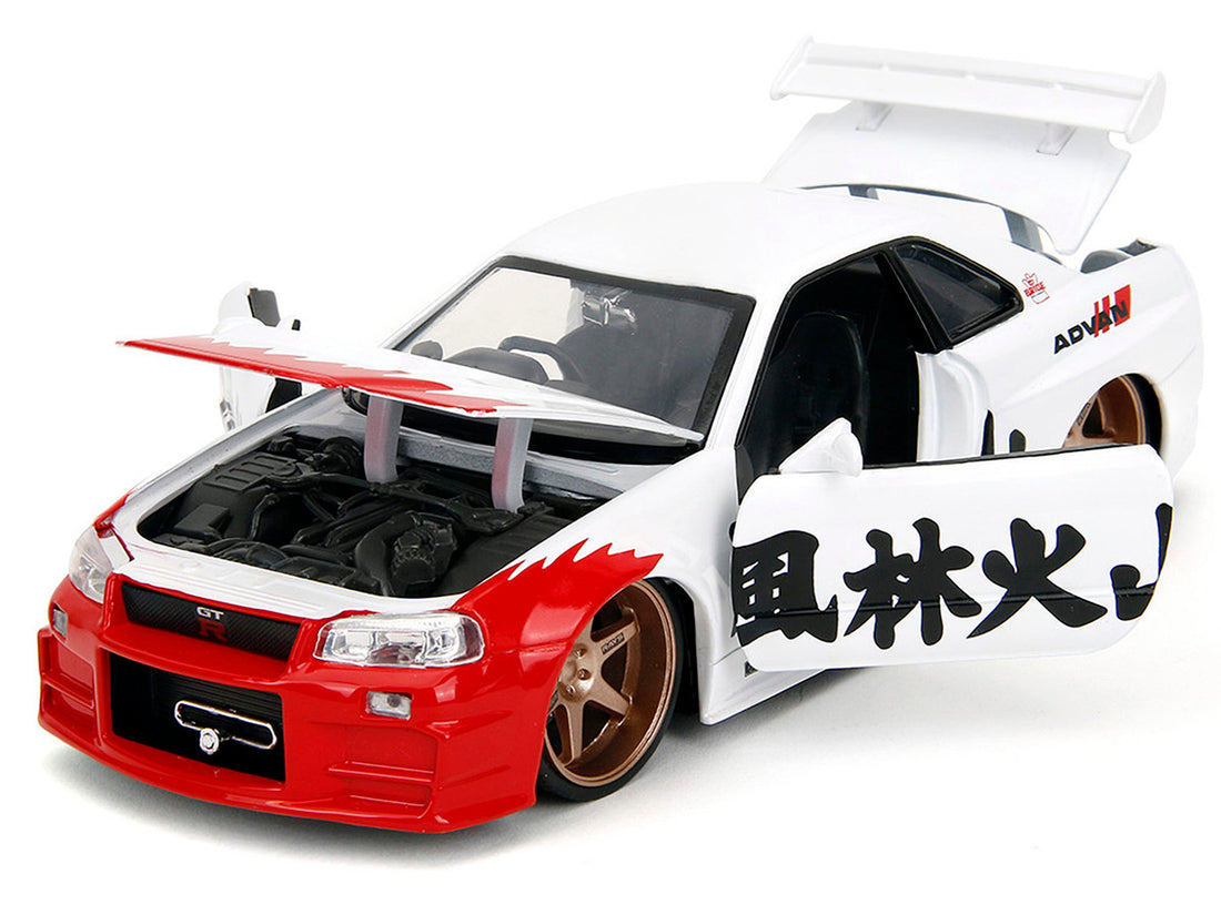 2002 Nissan Skyline GT-R (R34) RHD (Right Hand Drive) White with Red Graphics and Ryu Diecast Figure "Street Fighter" Video Game "Anime Hollywood Rides" Series 1/24 Diecast Model Car by Jada-3