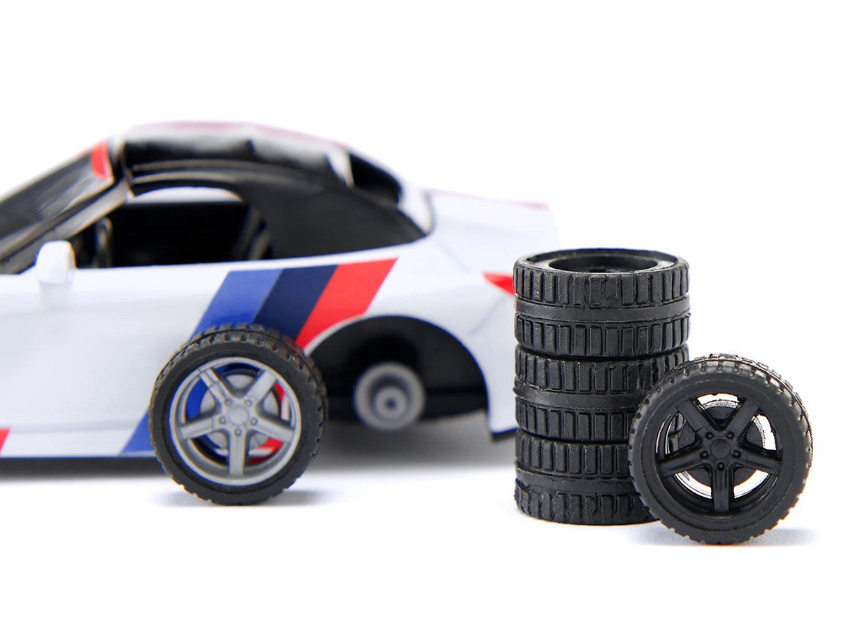 BMW Z4 M40i Cabriolet White with Black Top with Extra Wheels and Decals 1/50 Diecast Model by Siku-2