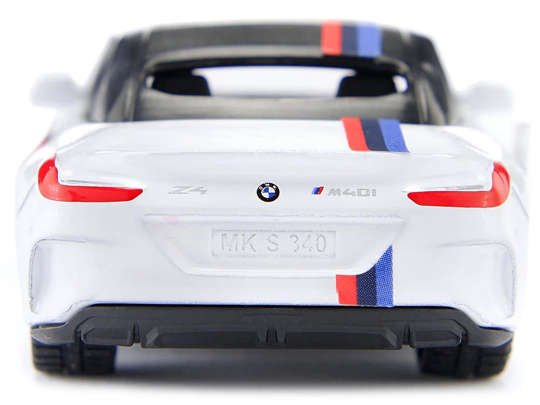 BMW Z4 M40i Cabriolet White with Black Top with Extra Wheels and Decals 1/50 Diecast Model by Siku-3