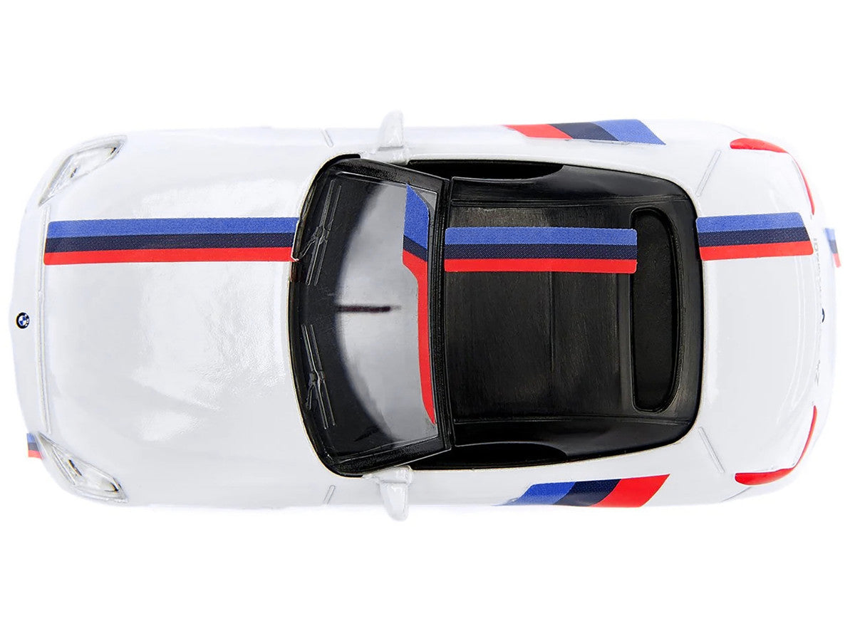 BMW Z4 M40i Cabriolet White with Black Top with Extra Wheels and Decals 1/50 Diecast Model by Siku-4