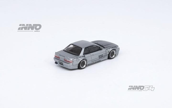 Nissan Silvia S13 (V1) Pandem Rocket Bunny in Silver 1:64 by Inno64 Angled Rear View