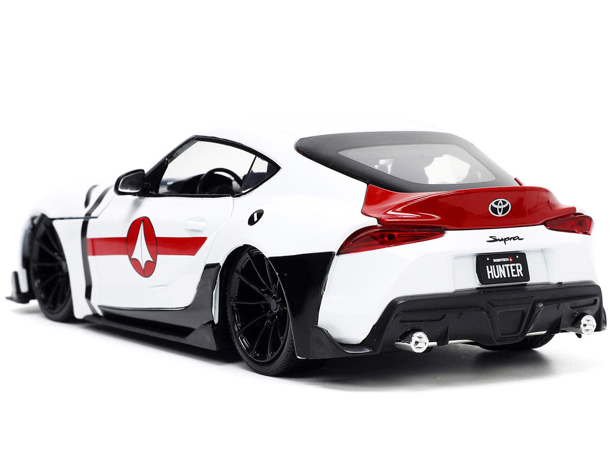 Toyota 2020 Supra White and Rick Hunter Diecast Figurine "Robotech" "Hollywood Rides" Series 1/24 Diecast Model Car by Jada 2