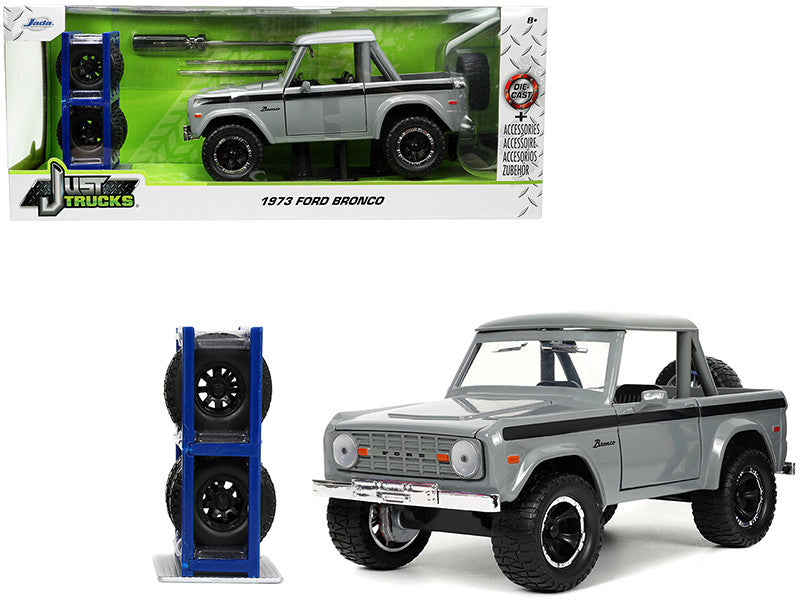 1973 Ford Bronco Pickup Truck Gray with Black Stripes with Extra Wheels "Just Trucks" Series 1/24 Diecast Model Car by Jada-0