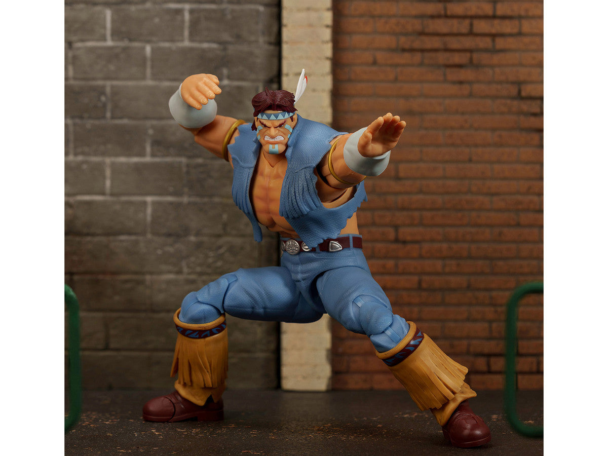 Jada Toys T. Hawk Ultra Street Fighter II action figure posed with eagle