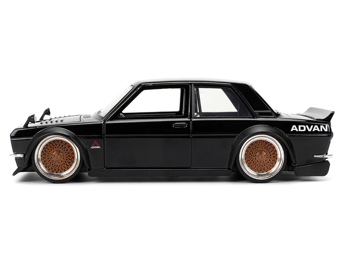 1973 Datsun 510 Black with Gold Wheels "JDM Tuners" Series 1/24 Diecast Model Car by Jada-1