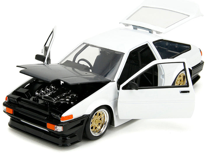 1986 Toyota Trueno (AE86) RHD (Right Hand Drive) White with Black Hood "JDM Tuners" Series 1/24 Diecast Model Car by Jada-1