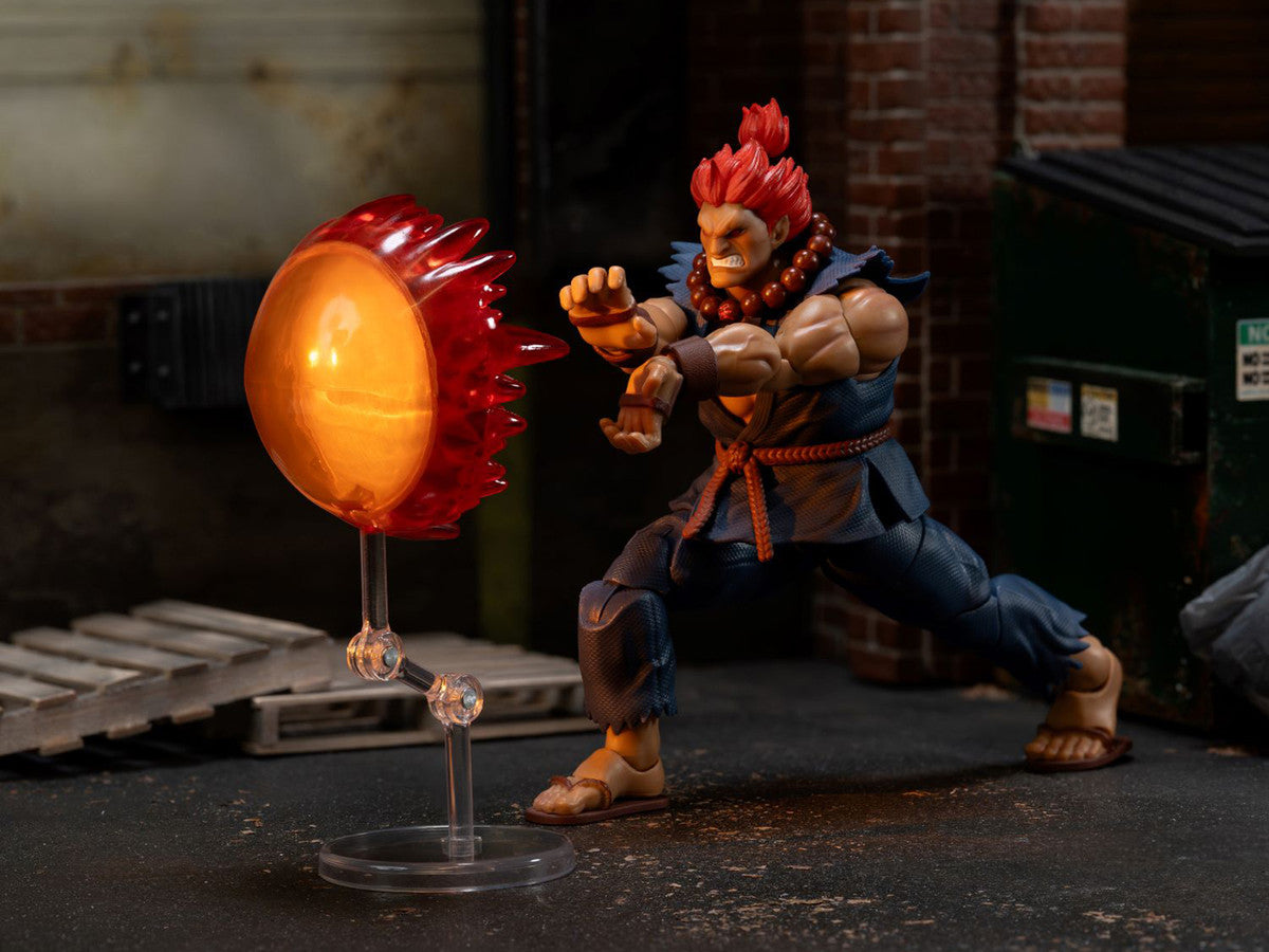 Akuma 6-inch Street Fighter action figure posed with fireball effect accessory