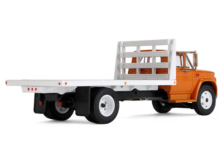 GMC 4000 Flatbed Truck Omaha Orange 1/64 Diecast Model by DCP/First Gear-1