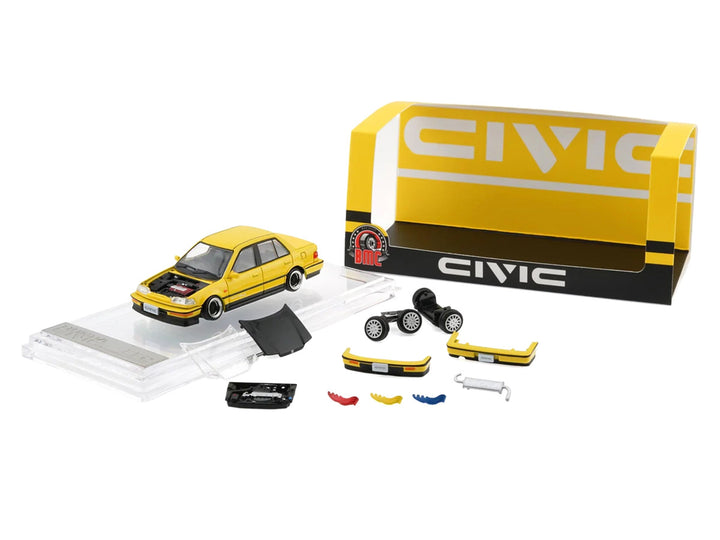 Honda Civic EF2 Custom Yellow 1/64 diecast model car by BM Creations displayed with interchangeable body parts, wheels, mirrors, and custom accessories.