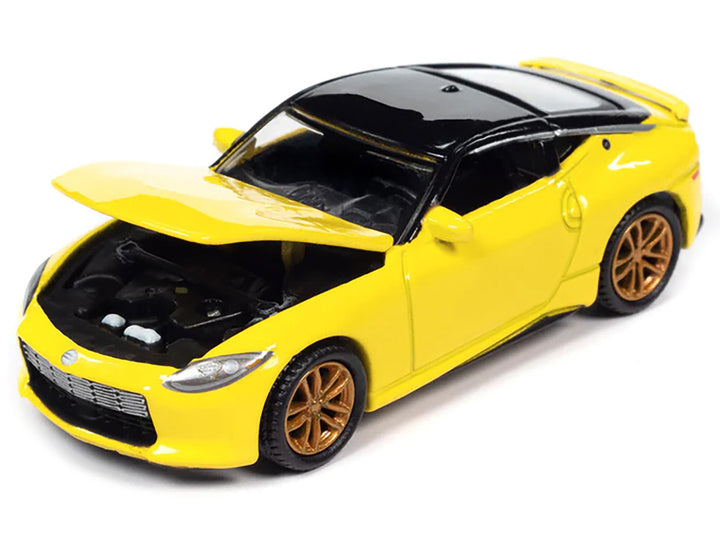2023 Nissan Z Ikazuchi Yellow with Super Black Top "Import Legends" Limited Edition 1/64 Diecast Model Car by Auto World-1