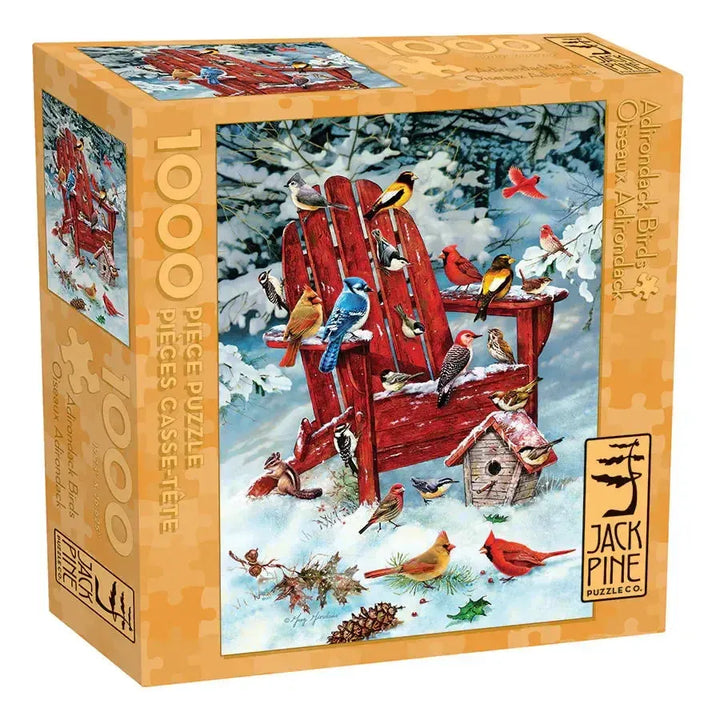 Jack Pine Adirondack Birds 1000 Piece Jigsaw Puzzle featuring colorful winter birds around a red Adirondack chair in the snow