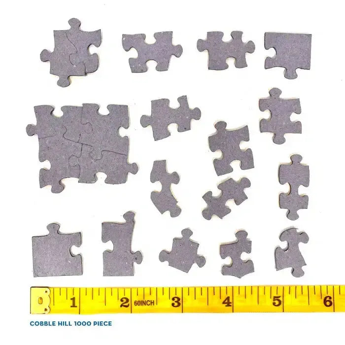 Cobble Hill An Evening Stroll 1000 Piece Jigsaw Puzzle featuring a horse-drawn carriage in a snowy winter neighborhood - puzzle pieces