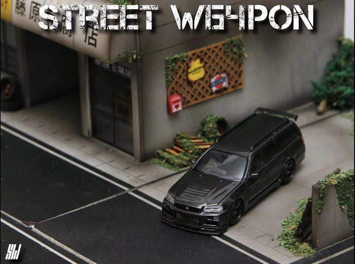 Nissan Stagea R34 Full Carbon 1:64 by Street Weapon Front Angle