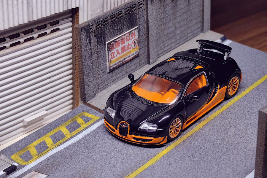 Bugatti Veyron Super Sport in Black/Orange With Adjustable Wing & Removable Rear Engine Cover 1:64 Scale Diecast Model by Mortal