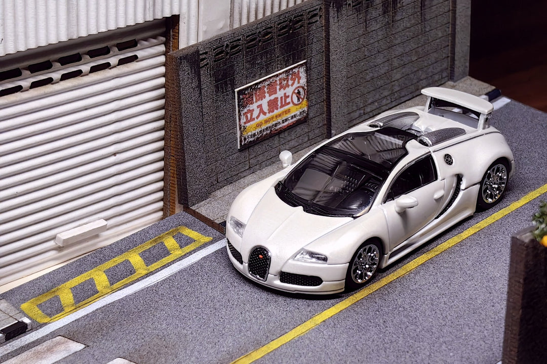 Bugatti Veyron in White or Red With Adjustable Wing 1:64 Scale Diecast Model by Mortal shown in White