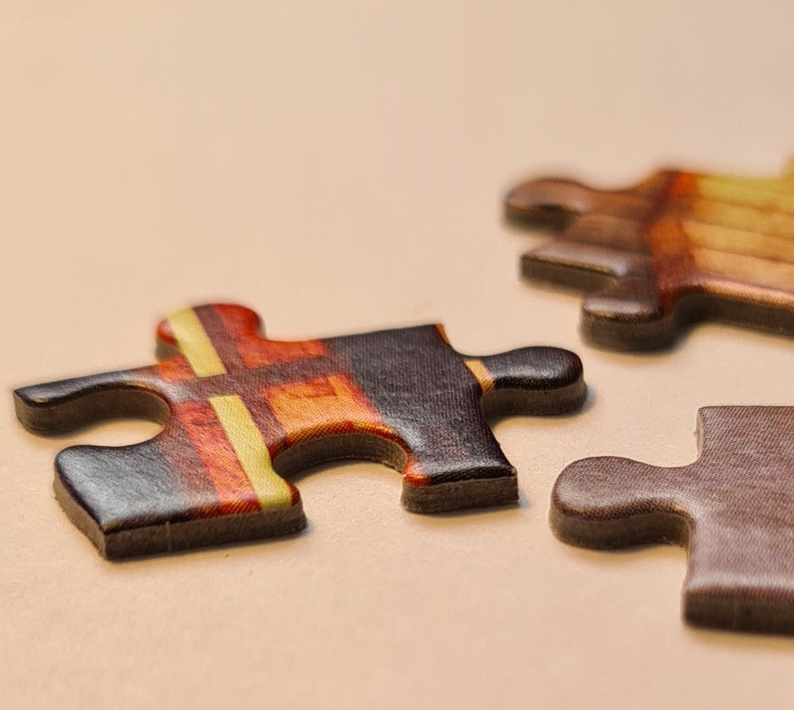 Close-up of interlocking jigsaw puzzle pieces showing piece shape and construction