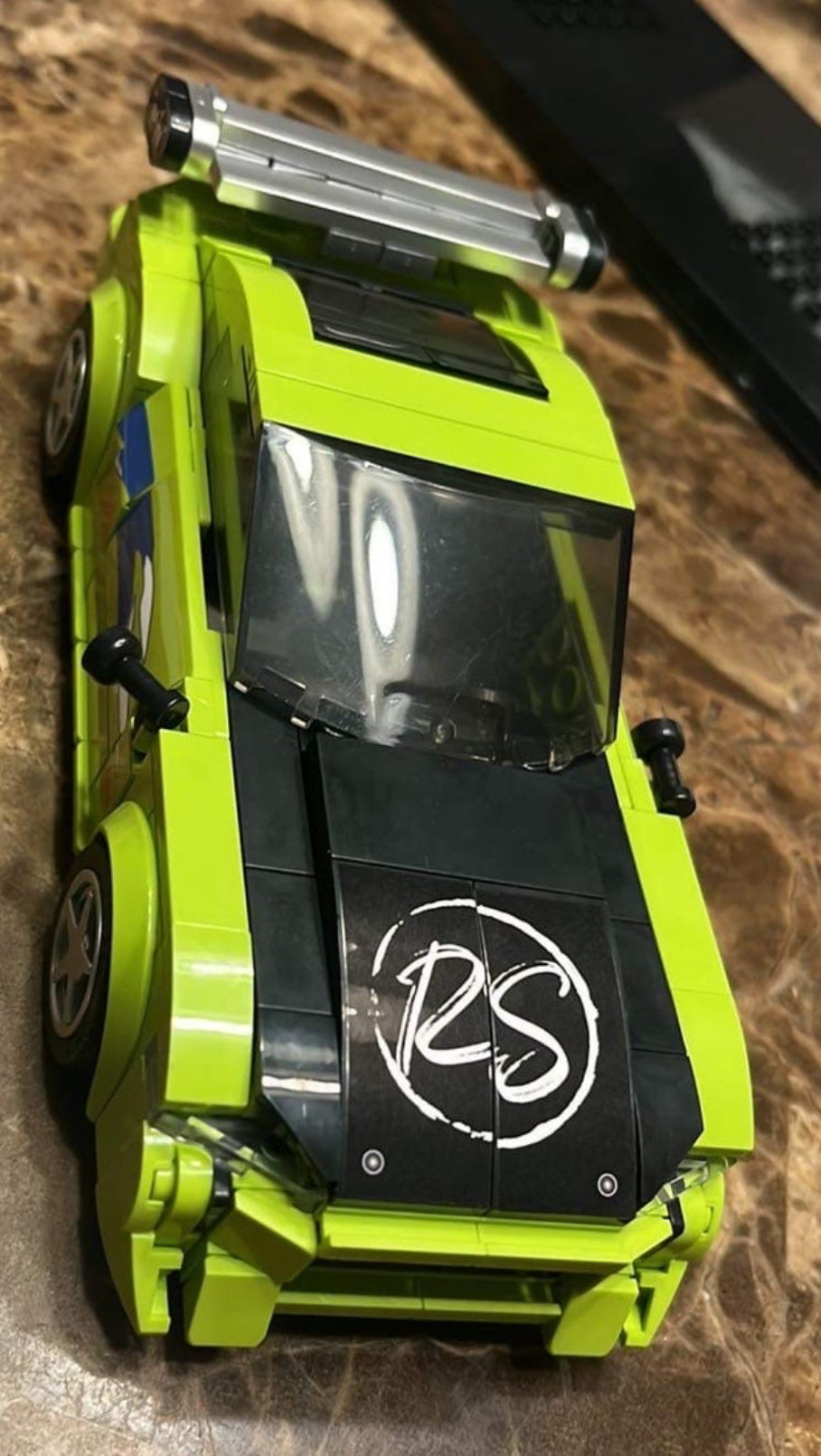 Mitsubishi Eclipse building set viewed from above showing black hood and tuner car details