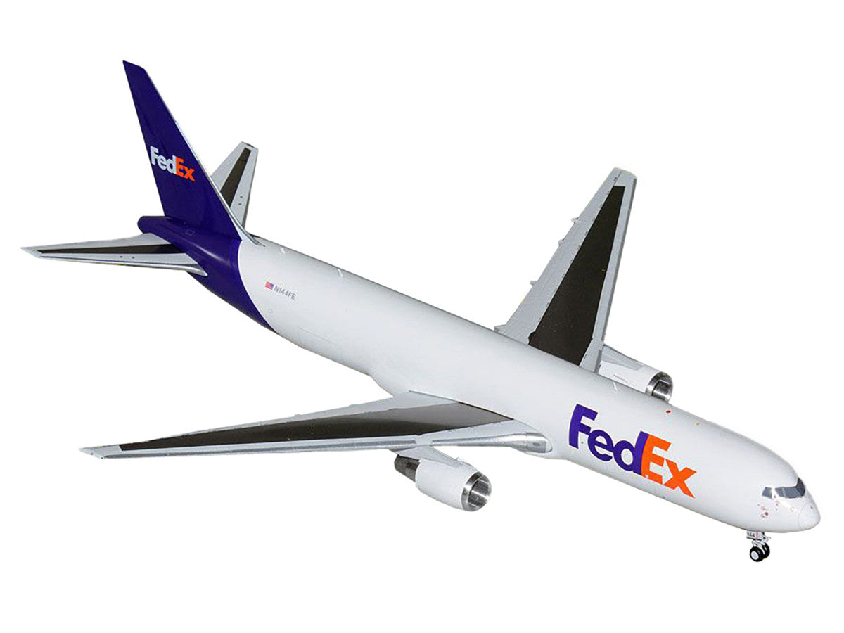Boeing 767-300F Commercial Aircraft "FedEx (Federal Express)" (N144FE) White with Purple Tail "Gemini 200" Series 1/200 Diecast Model Airplane by GeminiJets-1