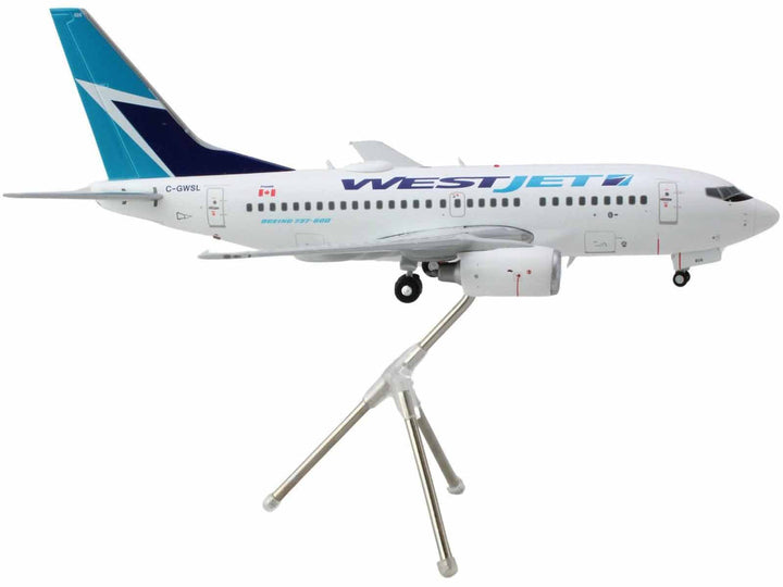 Boeing 737-600 Commercial Aircraft "WestJet" (C-GWSL) White with Blue Tail "Gemini 200" Series 1/200 Diecast Model Airplane by GeminiJets-1