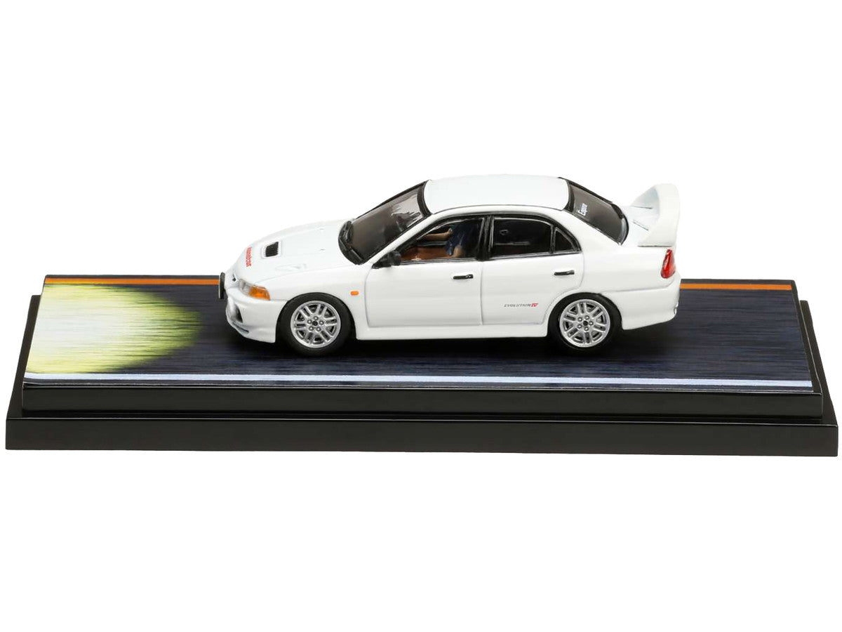 Mitsubishi Lancer RS Evolution IV RHD (Right Hand Drive) White "Monstar" with Seiji Iwaki Driver Figure "Initial D" (1995-2013) Manga 1/64 Diecast Model Car by Hobby Japan-1