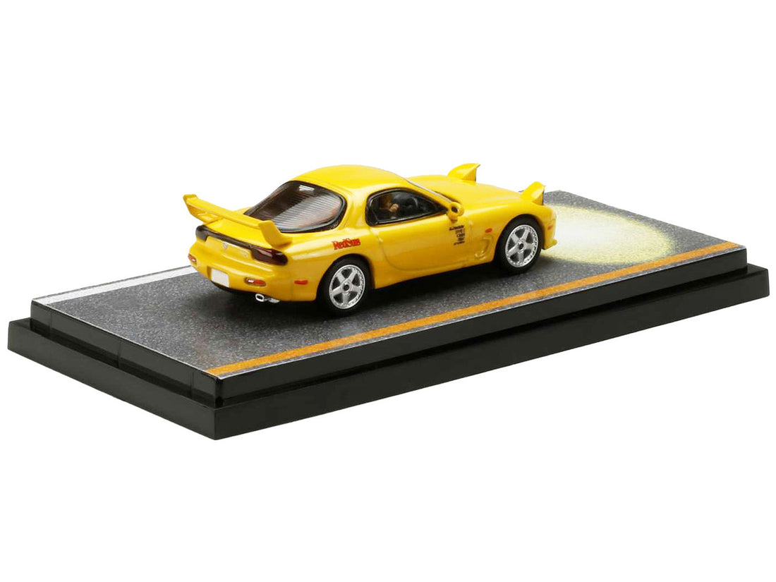 Mazda RX-7 (FD3S) RHD (Right Hand Drive) Yellow "RedSuns" with Keisuke Takahashi Driver Figure (Version 2) "Initial D" (1995-2013) Manga 1/64 Diecast Model Car by Hobby Japan-1