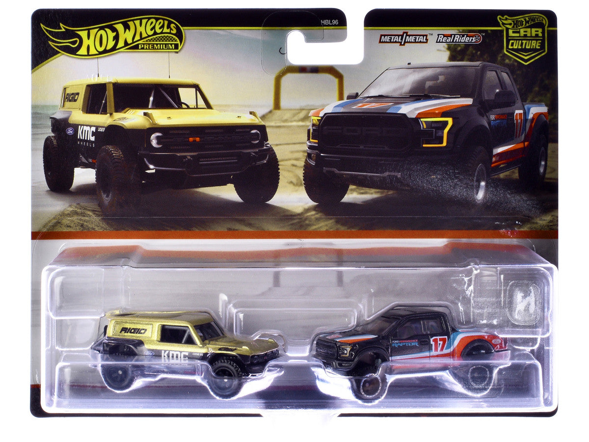 Ford Bronco R Gold Metallic and Black and 2017 Ford F-150 Raptor Pickup Truck #17 Black with Stripes "Car Culture" Set of 2 Cars Diecast Model Cars by Hot Wheels-1