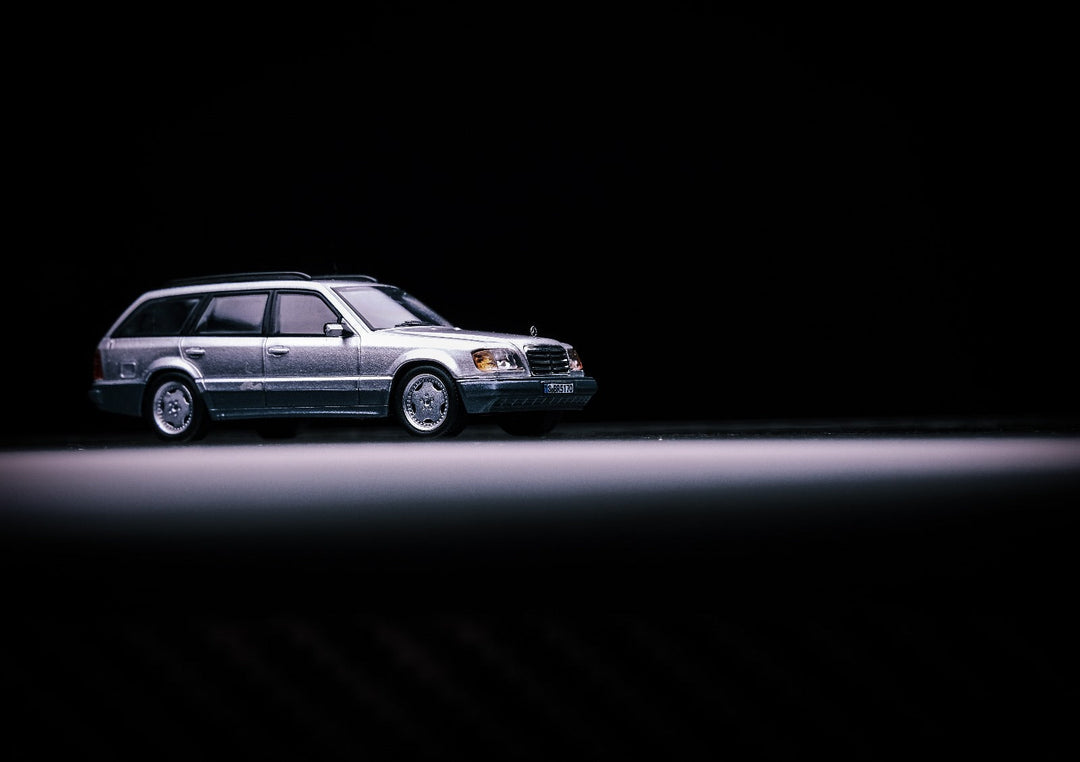 Mercedes-Benz Wagon Version S124 SILVER / BLUE 1:64 by Mortal Angled Front View