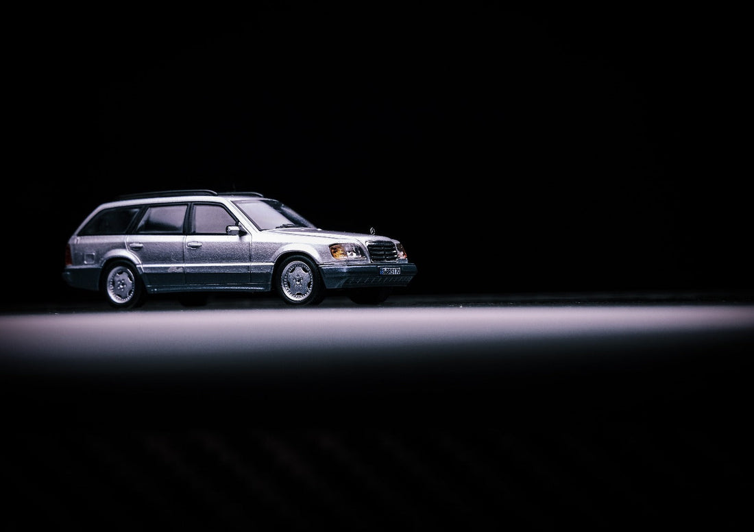 Mercedes-Benz Wagon Version S124 SILVER / BLUE 1:64 by Mortal Angled Front View