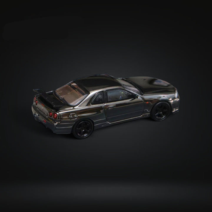 Nissan Skyline GTR R34 V-SPEC-II Chrome Plated Limited to 599 Pcs 1:64 by Street Weapon Angle Side View