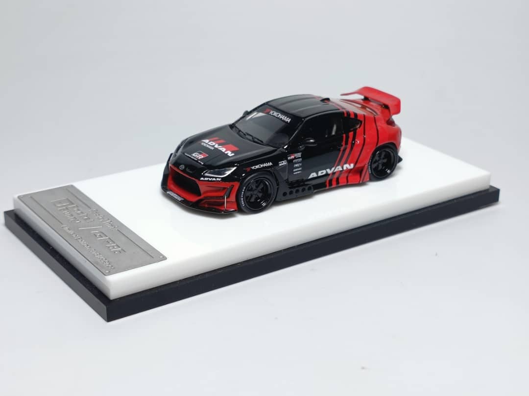 Toyota GR86 Rocket Bunny Resin Model FUJIWARA / SPOON / ADVAN 1:64 by Scale Mini Advan Angled Front