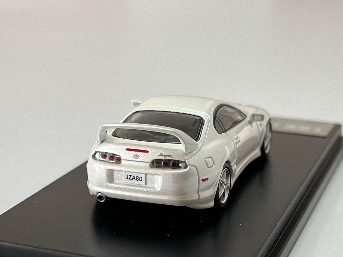 Toyota Supra JZA80Z in Pearl White 1:64 by 123 Hobby Rear View