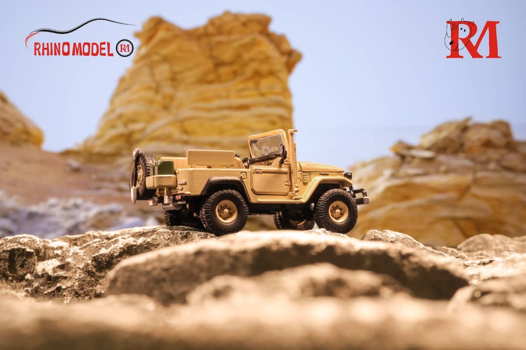 Toyota Land Cruiser FJ40 Pick Up Desert Yellow 1:64 by Rhino Model Passenger Side Angled View