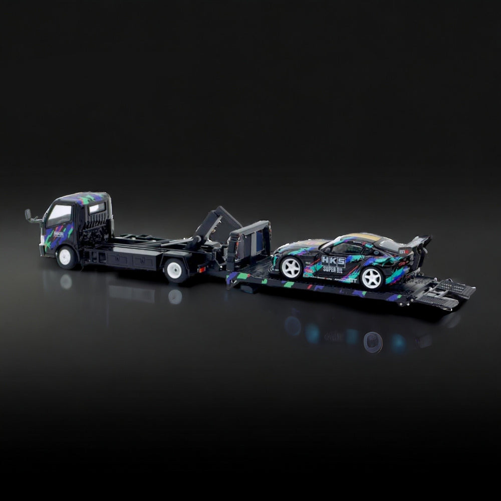 Hino 300 Dutro Flatbed Flatbed Tow Truck in HKS Livery 1:64 by Unique Model Angled Driver Rear View