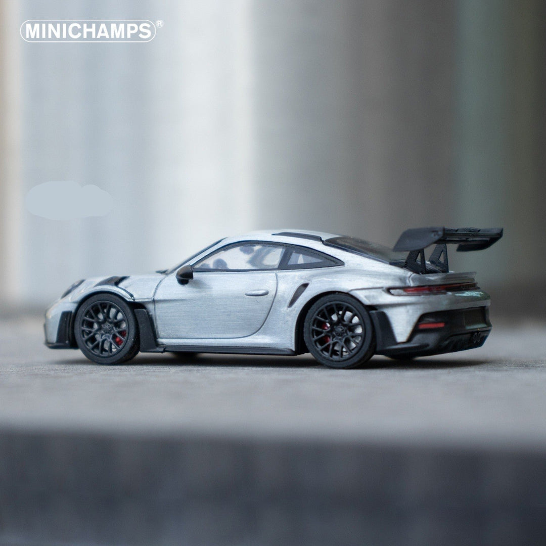 Porsche 911 GT3 RS in Raw Silver English Magazine Version 1:64 by Minichamps (MAGAZINE INCLUDED) Drivers Side View