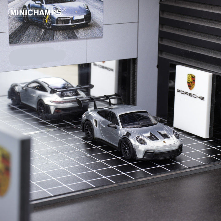 Porsche 911 GT3 RS in Raw Silver English Magazine Version 1:64 by Minichamps (MAGAZINE INCLUDED) Showroom