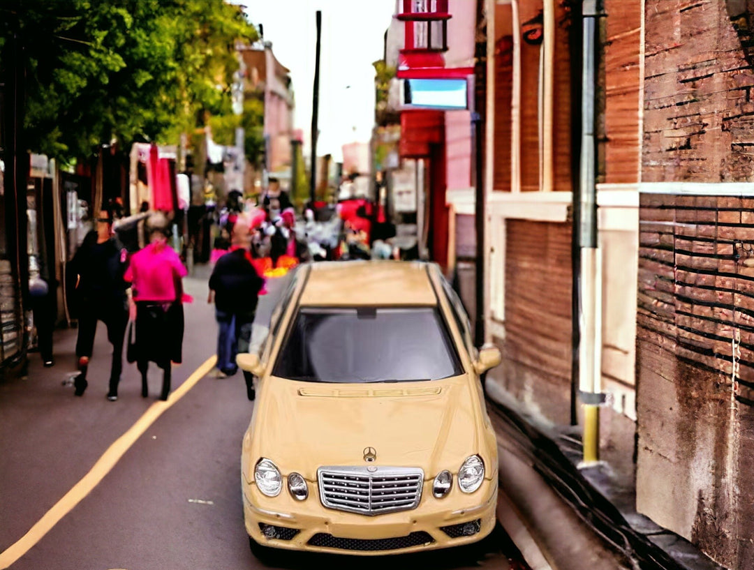 Mercedes-Benz E63 AMG W211 Lowered in Desert Yellow 1:64 by MK Model Street Front View