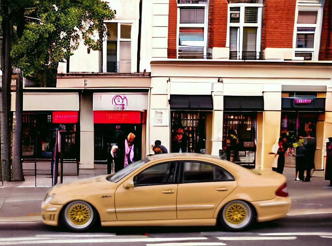 Mercedes-Benz E63 AMG W211 Lowered in Desert Yellow 1:64 by MK Model Side View Driver Side