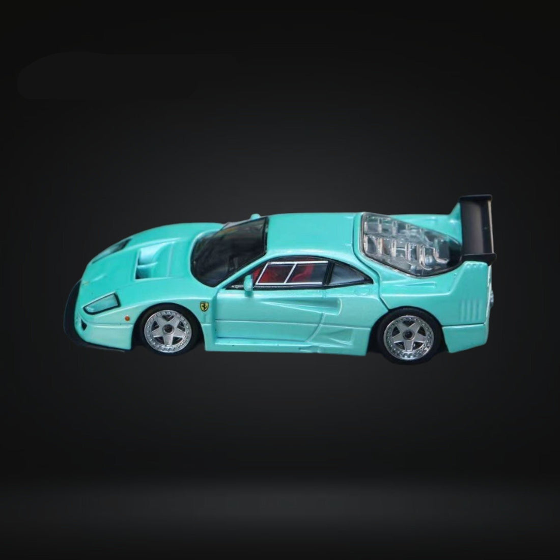 Ferrari F40 LM Light Aqua Green With Removable Rear Engine Cover 1:64 by Stance Hunters Side View