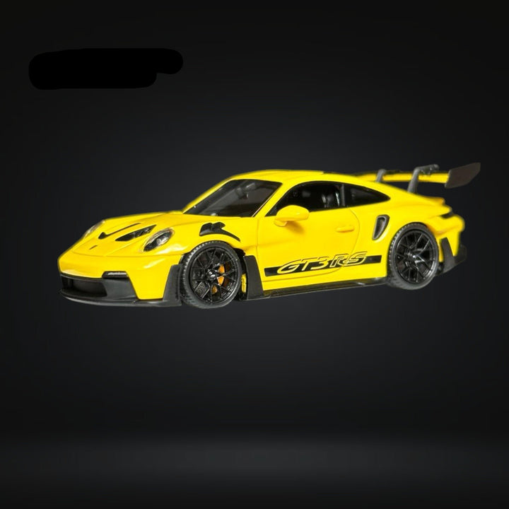 Porsche 911 (992) GT3 RS in Racing Yellow 1:64 by FuelMe Driver Side Front View