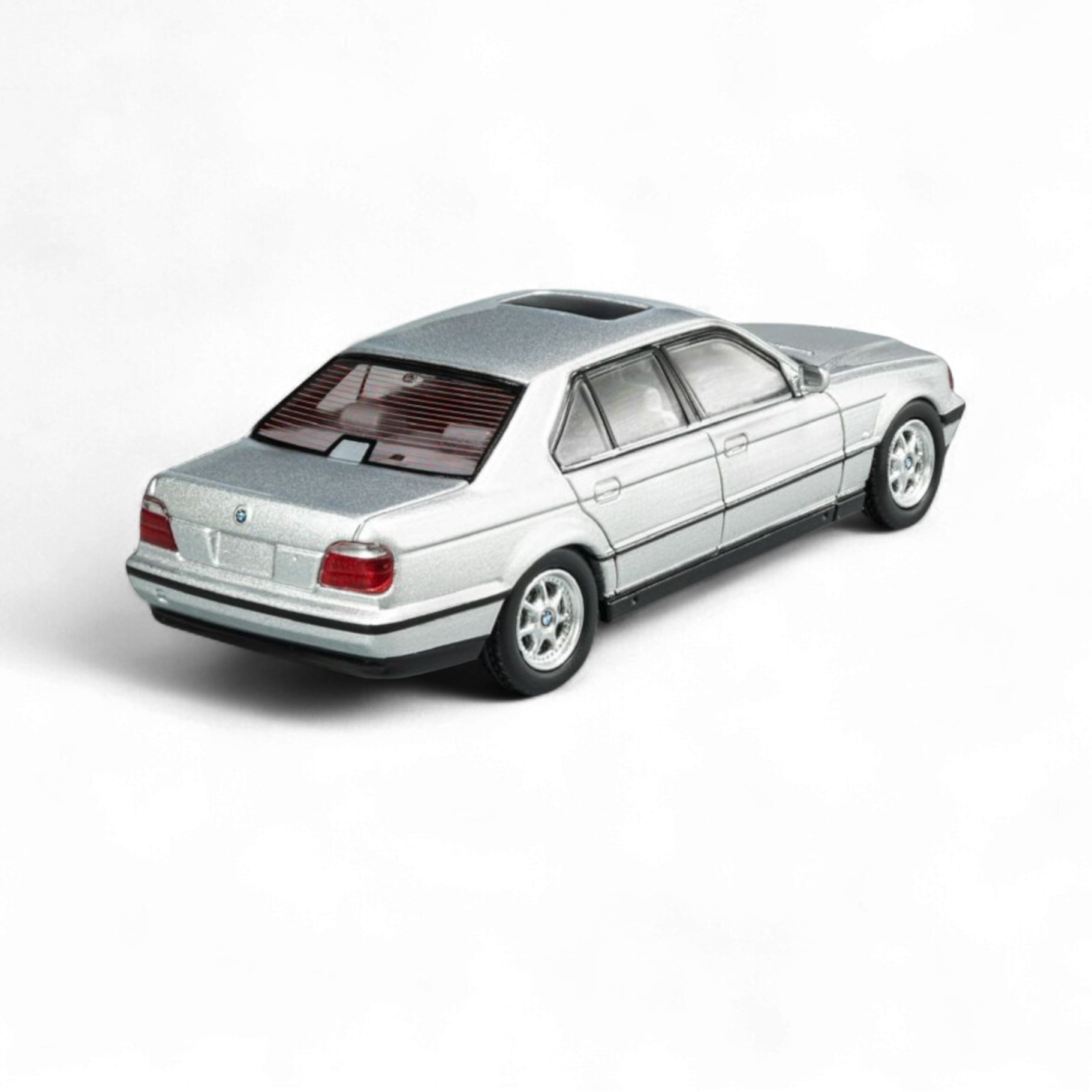 DCM BMW E38 740iL 7-Series in Silver 1:64 2