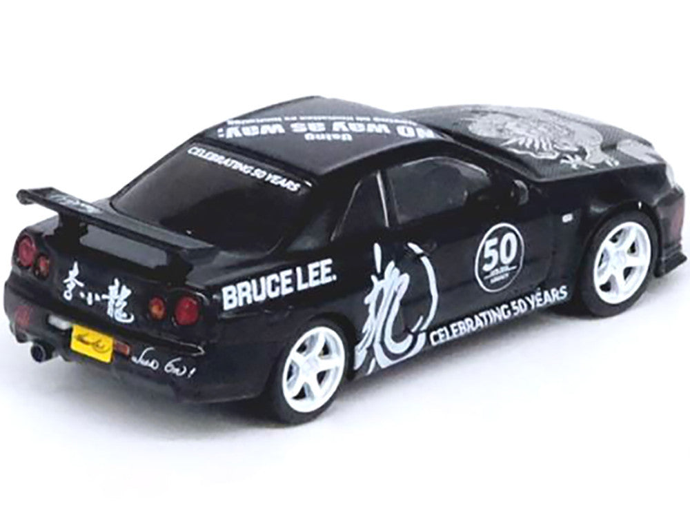 Nissan Skyline GT-R (R34) RHD (Right Hand Drive) Black "Bruce Lee Legacy 50 Year Anniversary" 1/64 Diecast Model Car by Inno Models-1