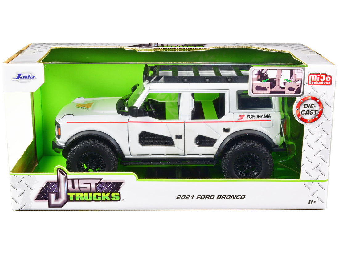 2021 Ford Bronco White with Red Stripes and Roof Rack "Yokohama Tires" "Just Trucks" Series 1/24 Diecast Model Car by Jada-0