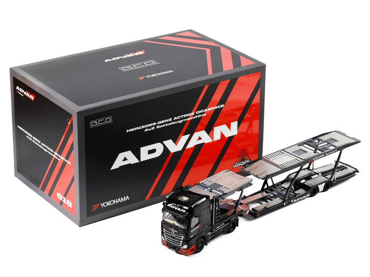 Mercedes-Benz Actros Gigaspace ADVAN Yokohama Black 1/64 diecast transporter by GCD with loading ramps extended beside its packaging.