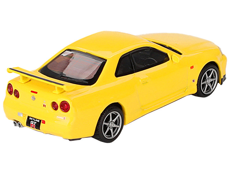 Nissan Skyline GT-R (R34) V-Spec RHD (Right Hand Drive) Lightning Yellow Limited Edition to 7920 pieces Worldwide 1/64 Diecast Model Car by Mini GT-1