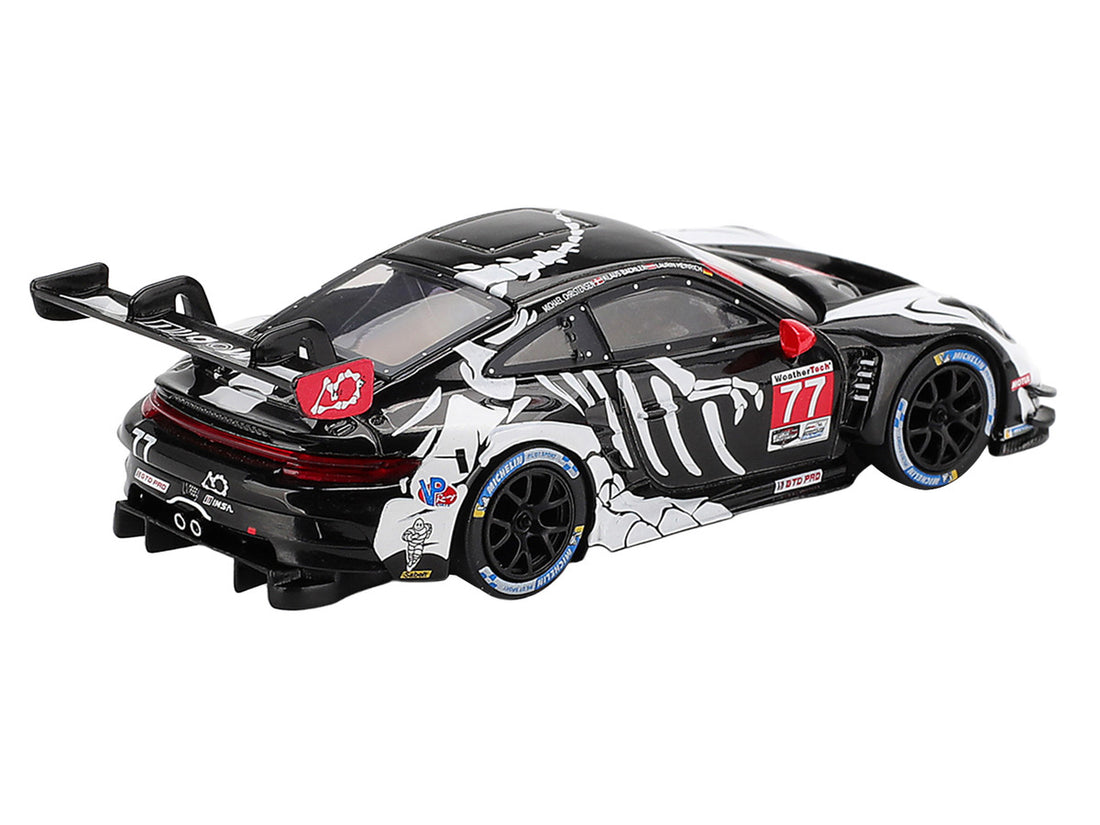 Porsche 911 GT3 R #77 Klaus Bachler - Laurin Heinrich - Michael Christensen "AO Racing Skeleton Rexy" GTD Pro IMSA "Petit Le Mans" (2025) Limited Edition 1/64 Diecast Model Car by Mini GT-3