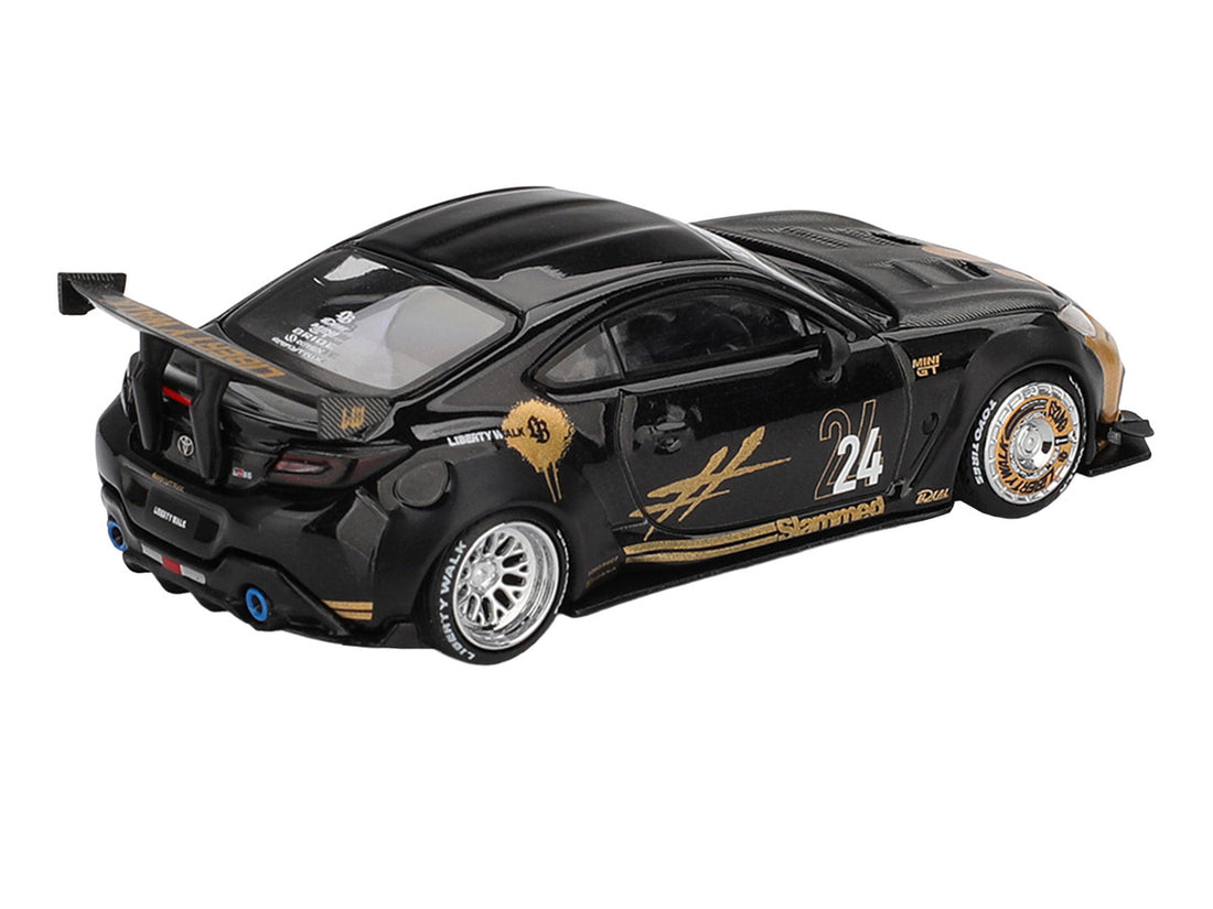 Toyota GR86 "LB-Nation - Liberty Walk" #24 Black with Carbon Hood and Gold Graphics Limited Edition 1/64 Diecast Model Car by Mini GT 2
