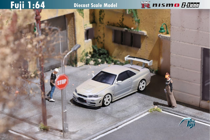 Nissan Skyline GT-R R34 Nismo Z-Tune High Wing 1:64 by Fuji Front View