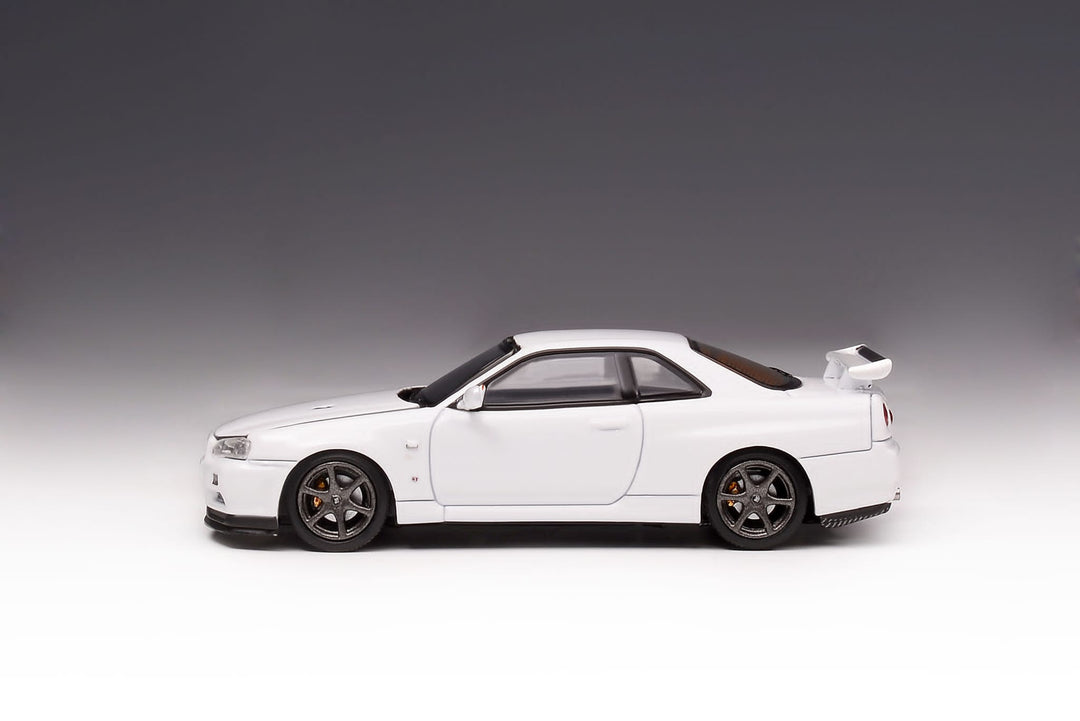 Nissan Skyline GT-R R34 V Spec II 1:64 Scale Diecast Model by Motorhelix Side View in White