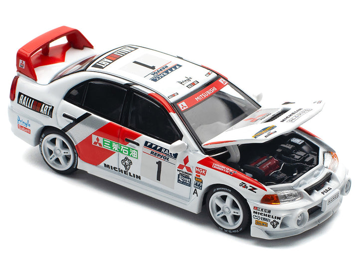 Mitsubishi Lancer Evolution IV RHD (Right Hand Drive) #1 Tommi Makinen - Seppo Harjanne Winner "Rally de Catalunya" (1997) 1/64 Diecast Model Car by Pop Race-1