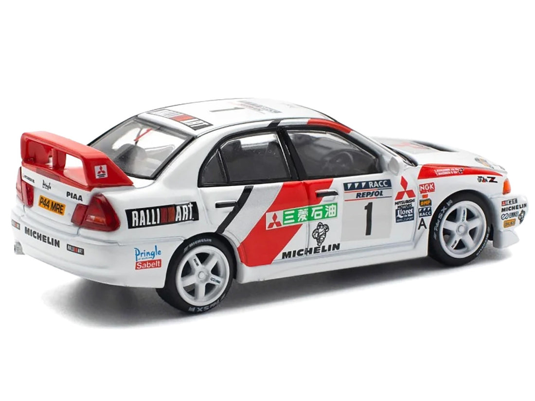 Mitsubishi Lancer Evolution IV RHD (Right Hand Drive) #1 Tommi Makinen - Seppo Harjanne Winner "Rally de Catalunya" (1997) 1/64 Diecast Model Car by Pop Race-3